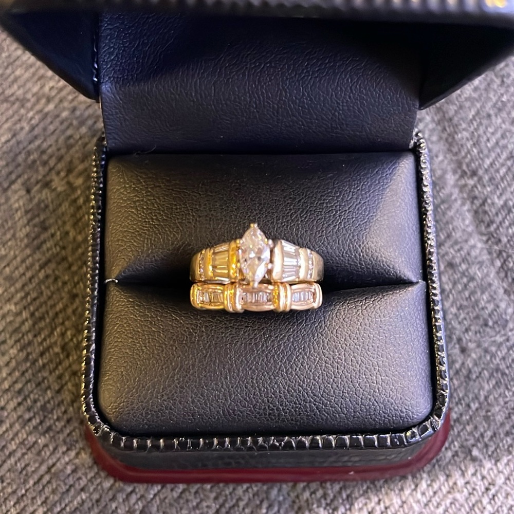 Gold and diamond engagement ring and wedding band